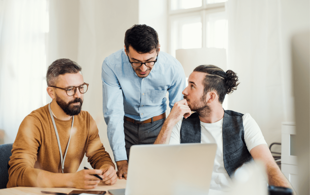 demo-attachment-1216-group-of-young-businesspeople-with-laptop-working-8SHTZUN